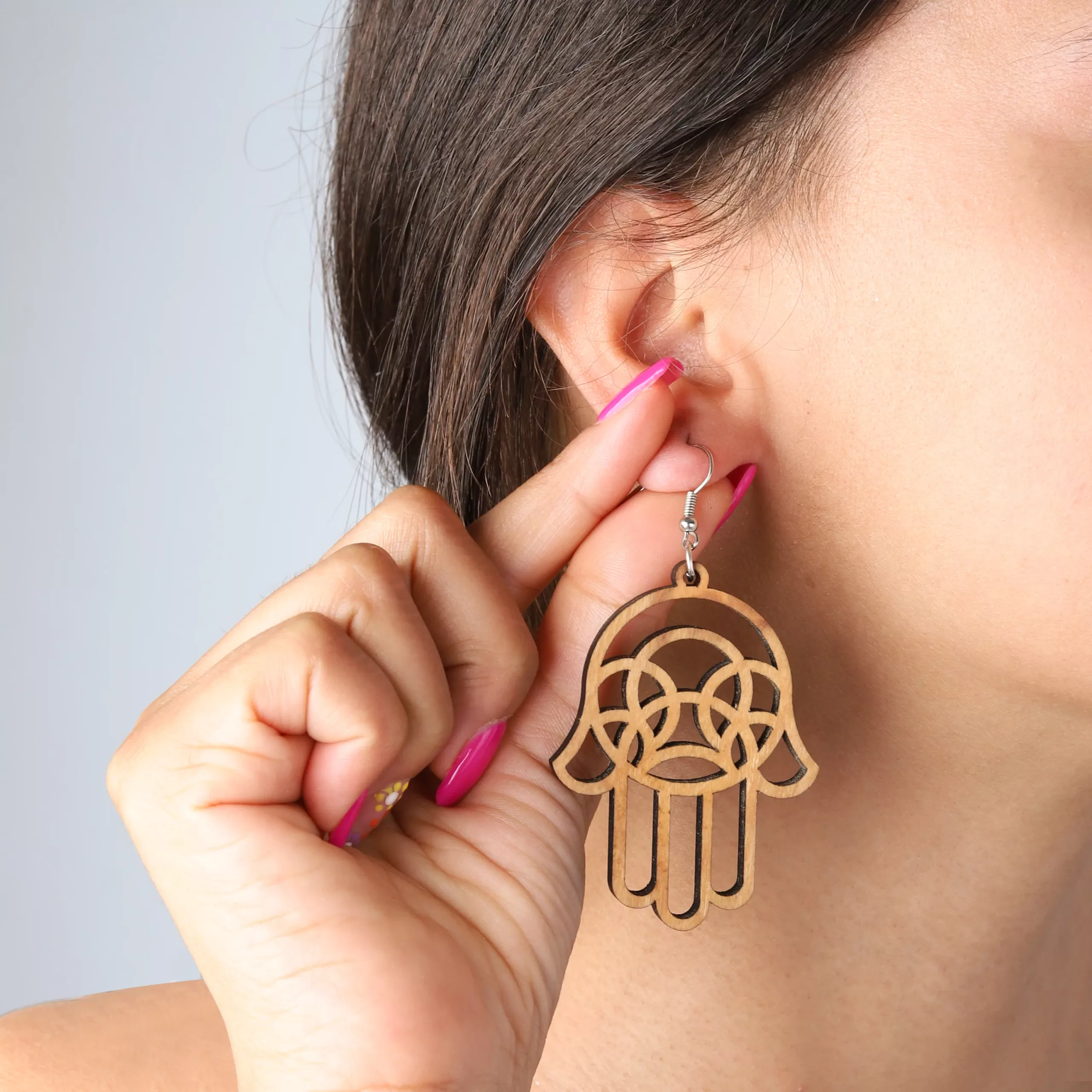 Boucles d’oreilles Khomsa en bois